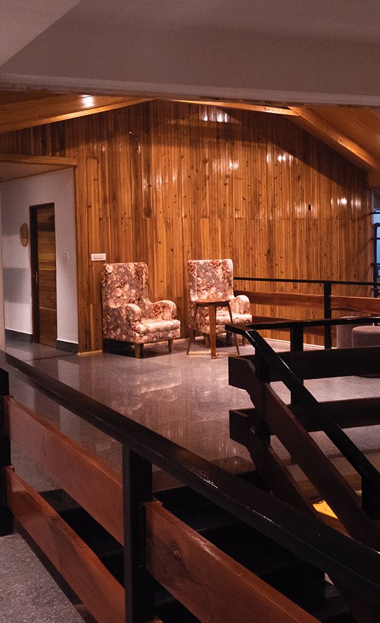 Wood-panelled lounge at Kaya Gantavya Resort & Spa, Pelling